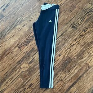 Adidas Ladie's Navy Blue Leggings with White Stripes. New with tags.